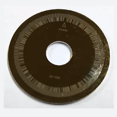 Reflective metal encoder disc